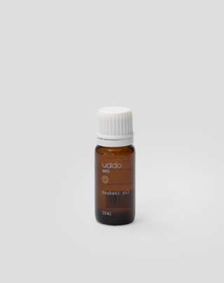 Huile multifonctionnelle de tsubaki pour les cheveux, le visage et le corps à base de camélia japonais 10 ml Uddo